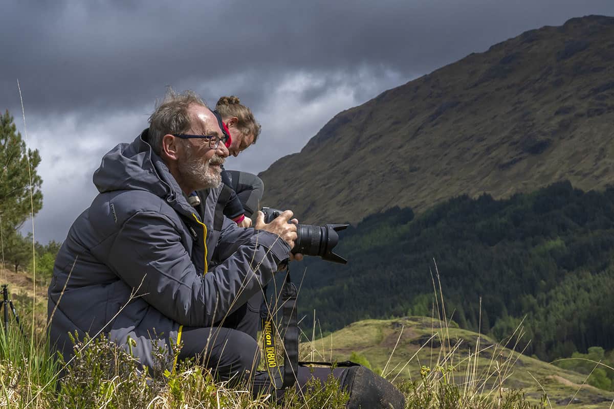 Fotoreis Schotland deelnemers in actie 57 Pim bij Glenfinnan Viaduct van Harry Potter