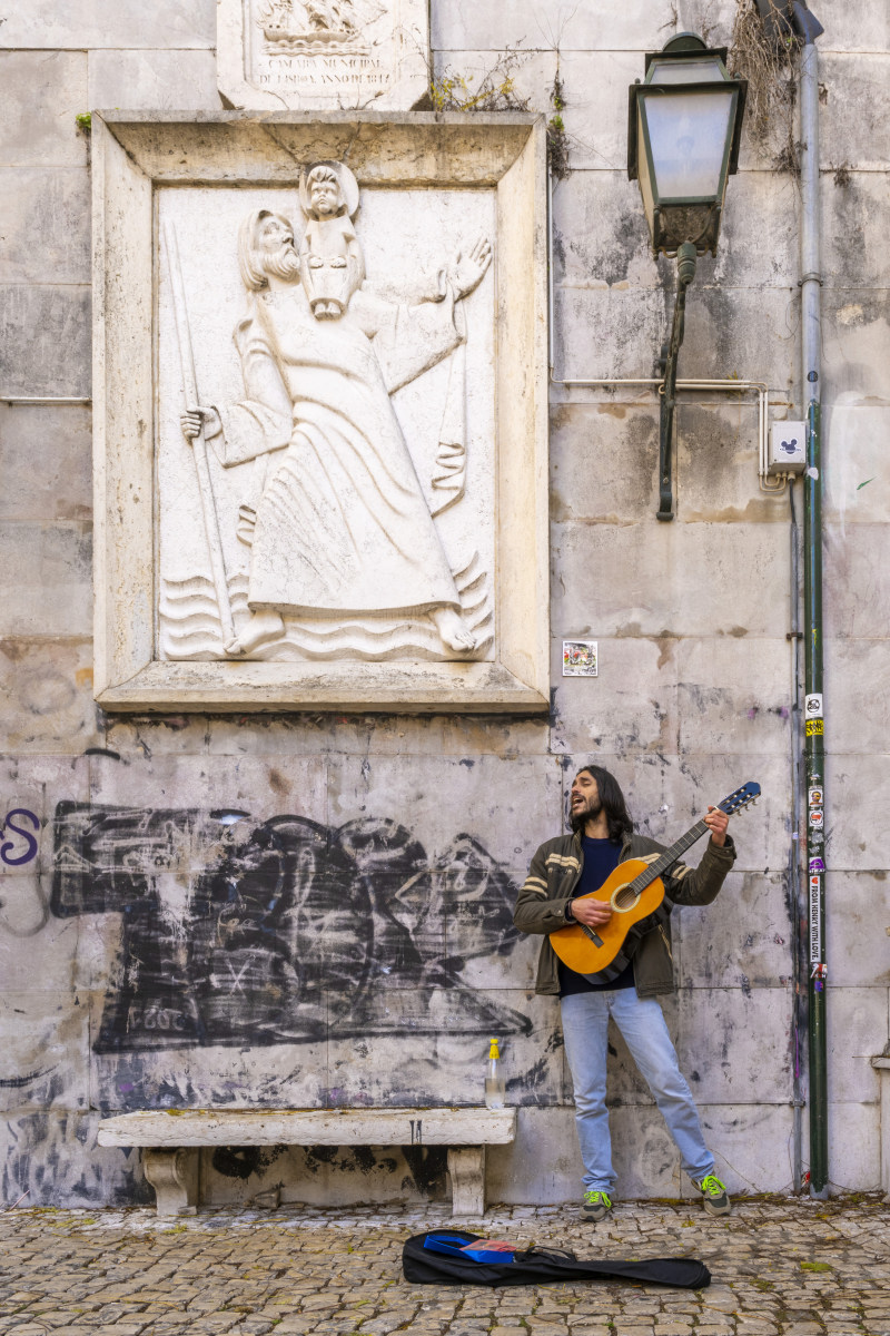 Straatzanger Lissabon Fotoreizen